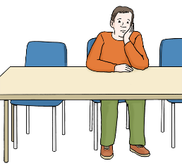 Person sitzt am Tisch allein und denkt nach Person sitzt am Tisch allein und denkt nach